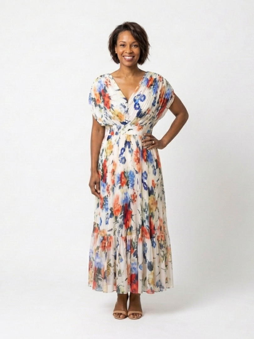 Vestido midi floral plisado de manga corta