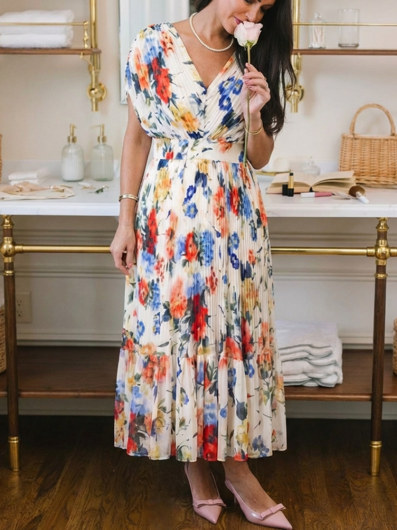 Vestido midi floral plisado de manga corta