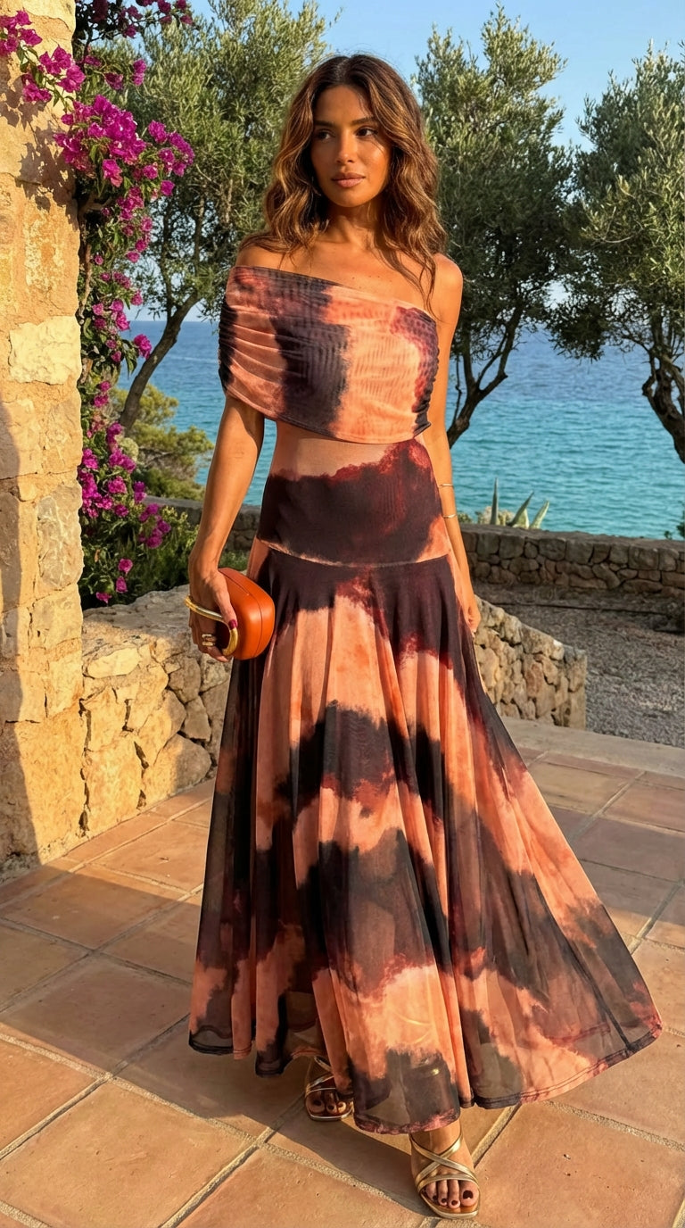 Vestido Carmina · Largo con estampado naranja y marrón