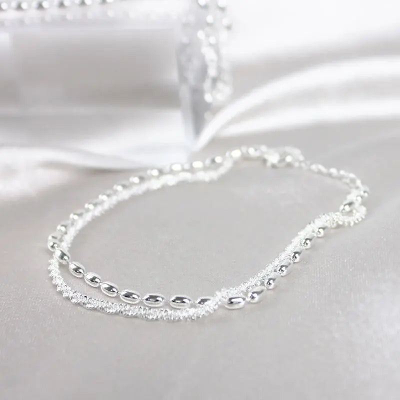 Set de Pulseras Plateadas con Detalles de Zirconia