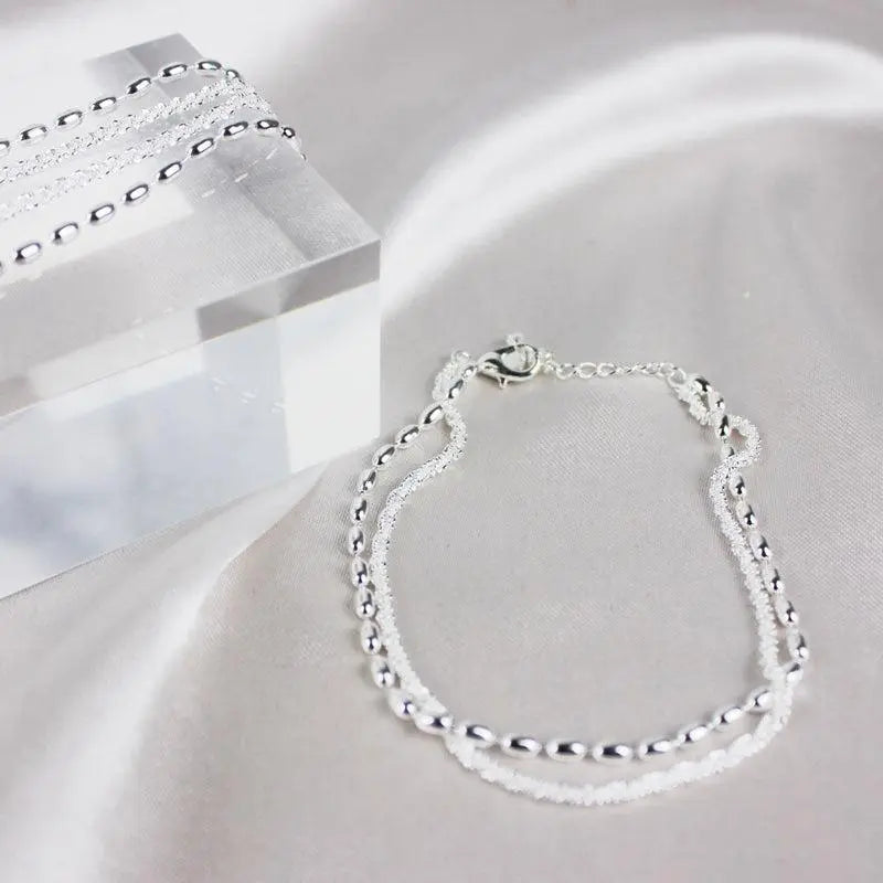 Set de Pulseras Plateadas con Detalles de Zirconia
