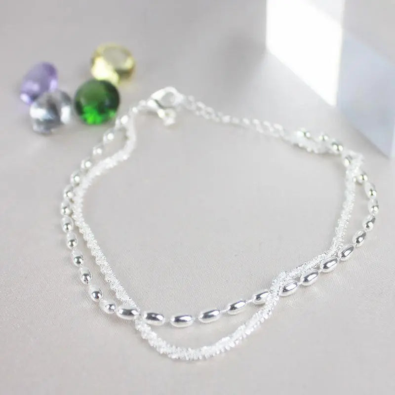 Set de Pulseras Plateadas con Detalles de Zirconia