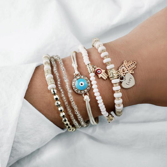 Set de Pulseras Doradas con Amuletos Hamsa